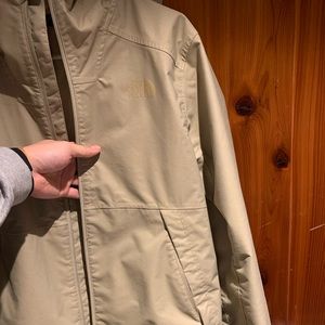 The North Face rain jacket in TAN